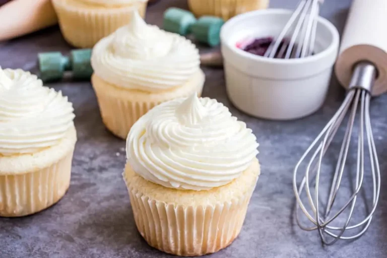 Almond Wedding Cake Cupcakes with Raspberry Filling