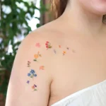 Read more about the article 20 Minimalist Shoulder Cap Tattoos for Women